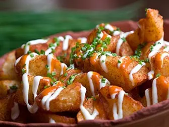 Las mejores tapas de Nueva York - patatas bravas en Boqueria
